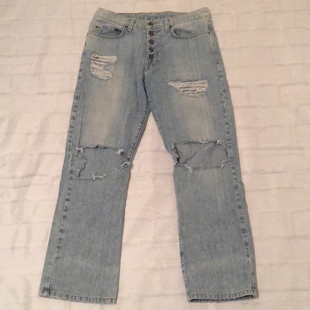Carmar destroyed high waisted front on one side ripped a lot. Not shown